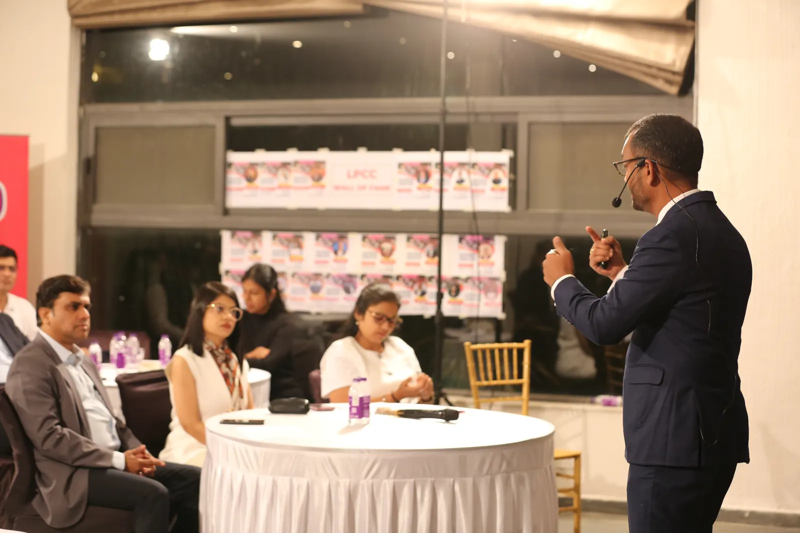 Shankar Jayaraman speaking on stage at an LPCC event