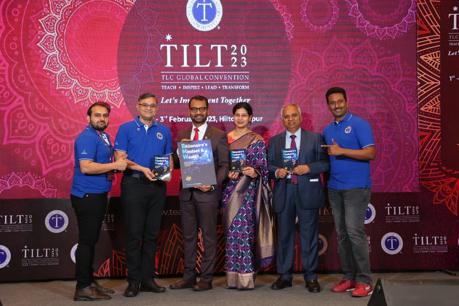 TILT 2023 TLC Global Convention book launch on stage
