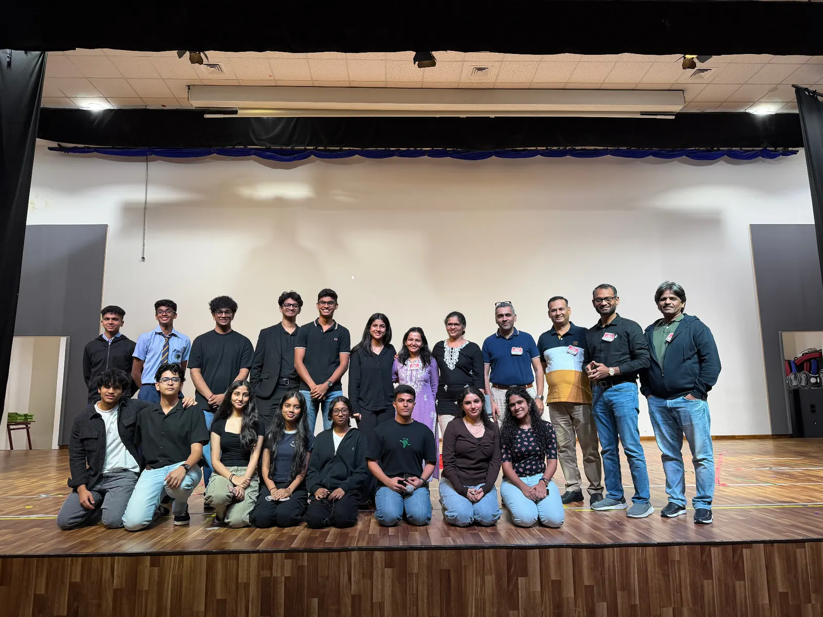Youth leadership cohort with Shankar and mentors on stage